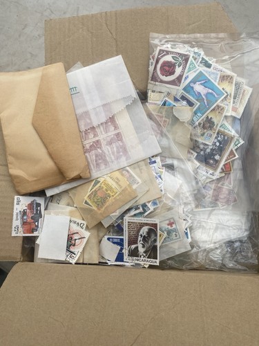 World stamps off paper - world,